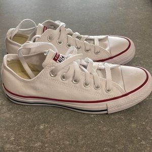 Brand new white Converse sneakers. Never worn. Size 6.5 US